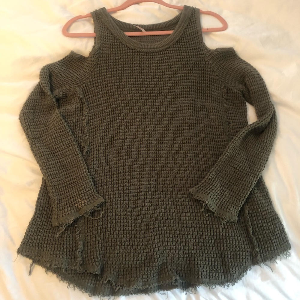 FREE PEOPLE shoulder-less green sweater.